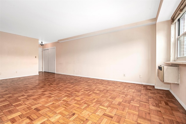 33 Barker Ave Unit 6K, White Plains, NY 10601 - empty room featuring baseboards and an AC wall unit