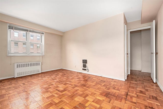 33 Barker Ave Unit 6K, White Plains, NY 10601 - spare room with radiator heating unit and baseboards