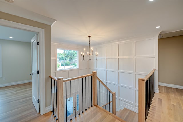 100 Root Ave, Islip, NY 11751 - stairs featuring a chandelier, wood finished floors, and recessed lighting
