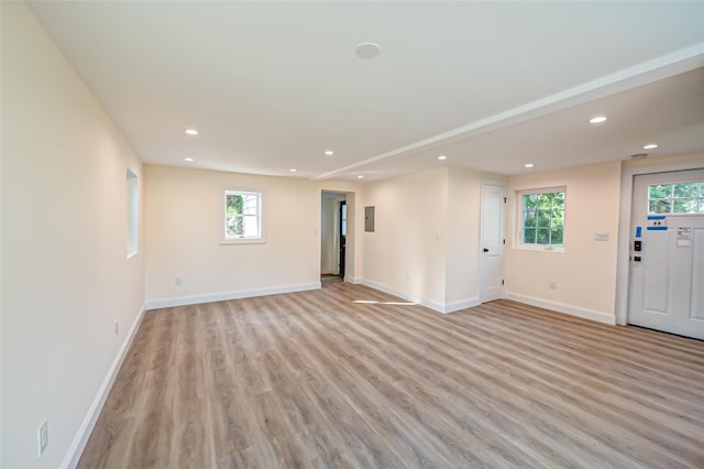 100 Root Ave, Islip, NY 11751 - unfurnished living room featuring light wood-style floors, recessed lighting, and electric panel