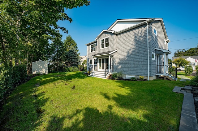 100 Root Ave, Islip, NY 11751 - back of property featuring a storage unit