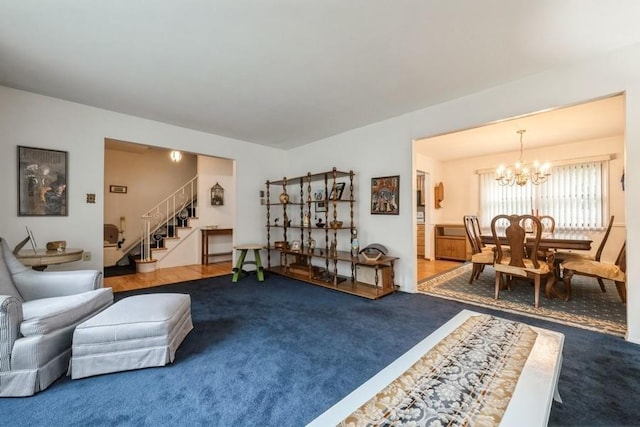 1581 Shirley Ct, North Merrick, NY 11566 - carpeted living room featuring stairs and a chandelier