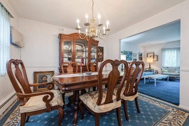 1581 Shirley Ct, North Merrick, NY 11566 - dining area with a chandelier and baseboard heating