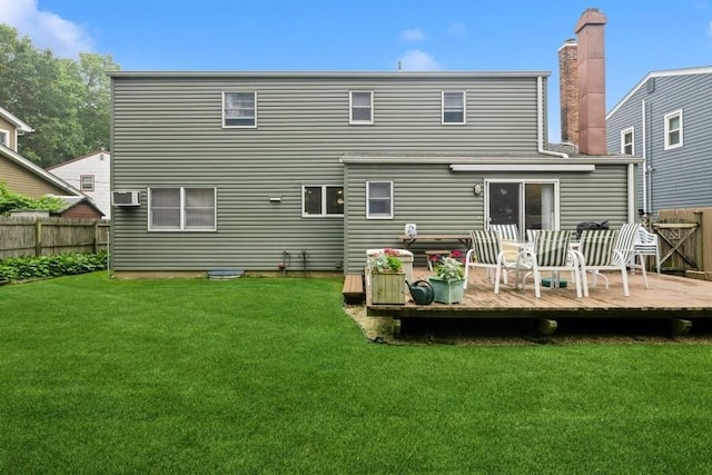 1581 Shirley Ct, North Merrick, NY 11566 - back of property with a wooden deck and a chimney