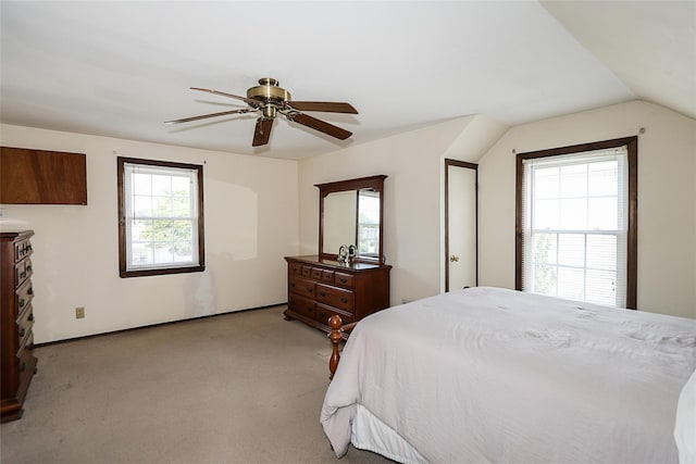 2199 Mcarthur St, East Meadow, NY 11554 - bedroom with multiple windows, light colored carpet, a ceiling fan, and lofted ceiling