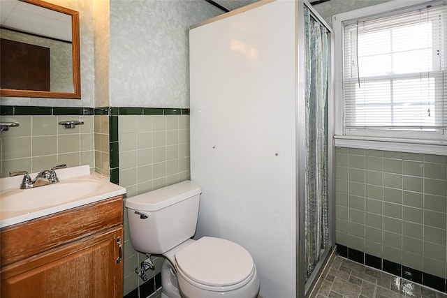 2199 Mcarthur St, East Meadow, NY 11554 - full bath featuring tile walls, vanity, and a stall shower