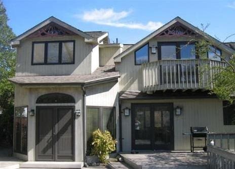 16 Wildwood Ln, Smithtown, NY 11787 - view of front facade with a balcony