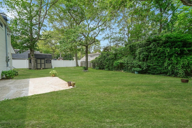 5439 Expressway Dr N, Holtsville, NY 11742 - fenced backyard featuring a patio area and a shed
