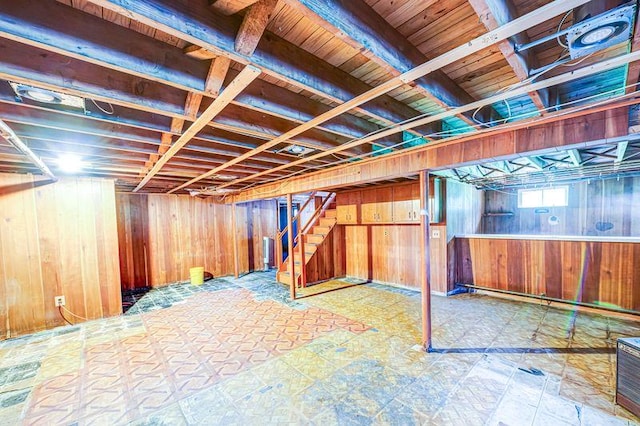 83 Bellerose Ave, East Northport, NY 11731 - basement featuring wood walls and stairs