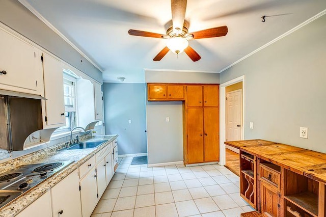 83 Bellerose Ave, East Northport, NY 11731 - kitchen featuring ceiling fan, electric stovetop, light countertops, light tile patterned floors, and white cabinetry