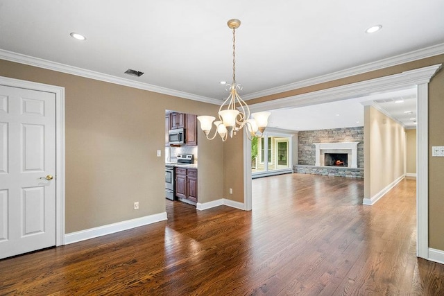 109 Oakside Dr, Smithtown, NY 11787 - unfurnished living room featuring a chandelier, dark wood-style flooring, ornamental molding, a stone fireplace, and recessed lighting