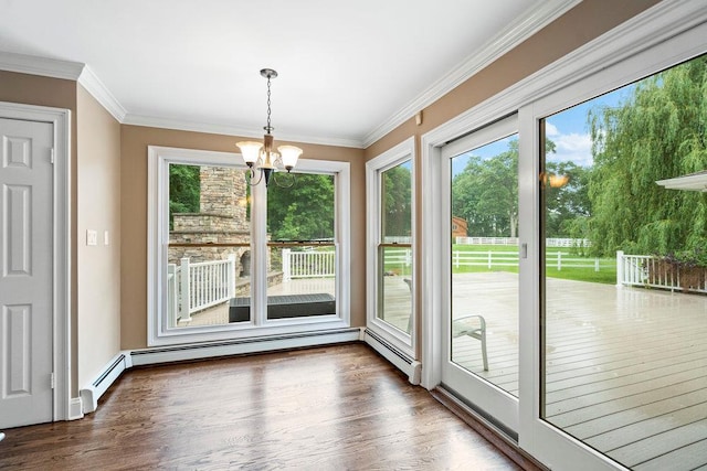 109 Oakside Dr, Smithtown, NY 11787 - doorway to outside featuring plenty of natural light, a chandelier, dark wood-style floors, and crown molding