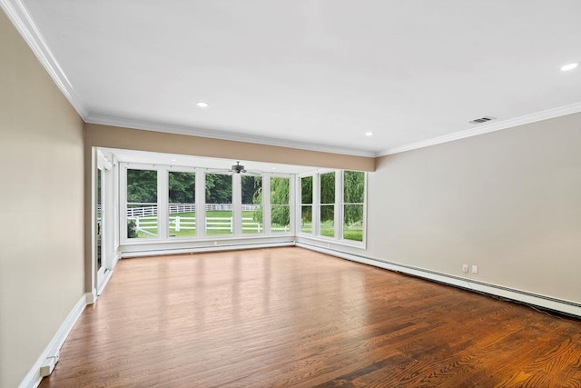109 Oakside Dr, Smithtown, NY 11787 - spare room with wood finished floors, crown molding, recessed lighting, a baseboard heating unit, and ceiling fan