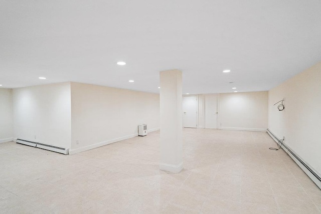 109 Oakside Dr, Smithtown, NY 11787 - finished basement with a baseboard radiator and recessed lighting