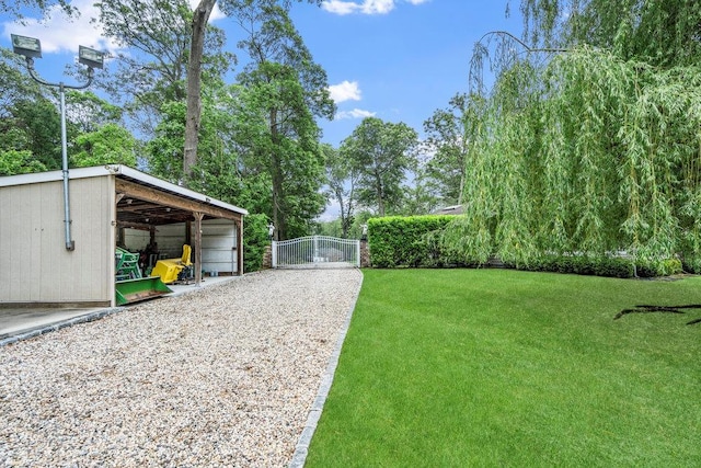109 Oakside Dr, Smithtown, NY 11787 - view of yard with a gate, an outbuilding, and driveway