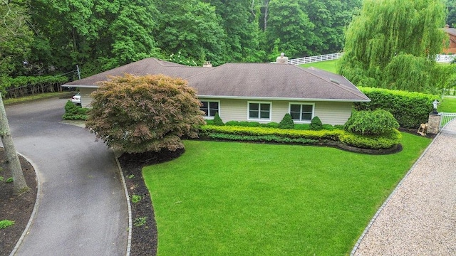 109 Oakside Dr, Smithtown, NY 11787 - single story home featuring a chimney and a wooded view