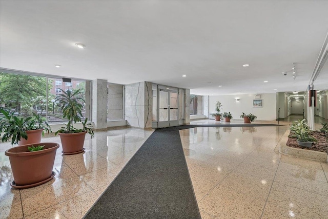 1 Sadore Ln Unit 7O, Yonkers, NY 10710 - lobby with recessed lighting and expansive windows