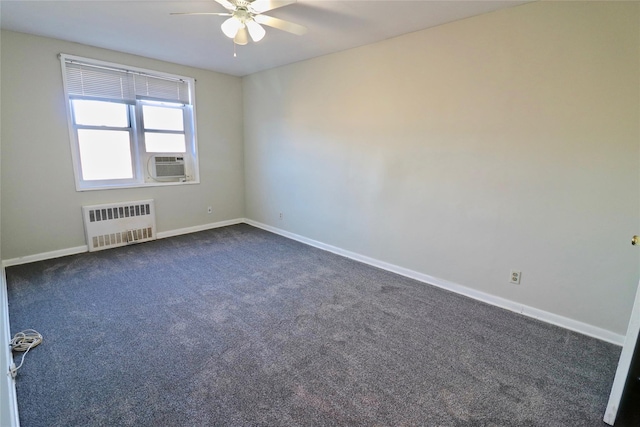 1 Sadore Ln Unit 7O, Yonkers, NY 10710 - spare room featuring radiator, ceiling fan, and dark colored carpet
