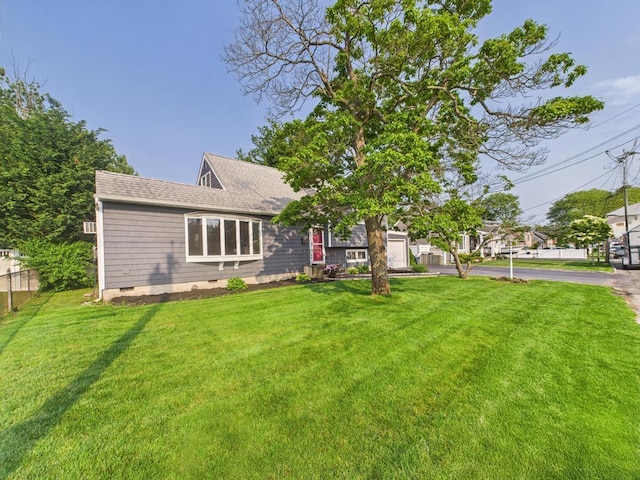 554 S 8th St, Lindenhurst, NY 11757 - view of front of property featuring driveway, a garage, roof with shingles, and crawl space