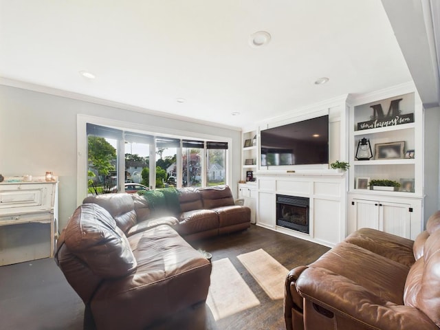 554 S 8th St, Lindenhurst, NY 11757 - living area with crown molding, a fireplace, built in shelves, recessed lighting, and dark wood-style floors