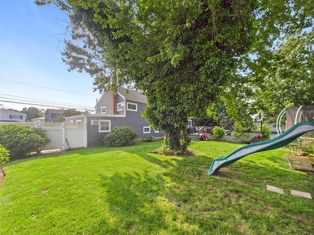 554 S 8th St, Lindenhurst, NY 11757 - view of yard with a playground