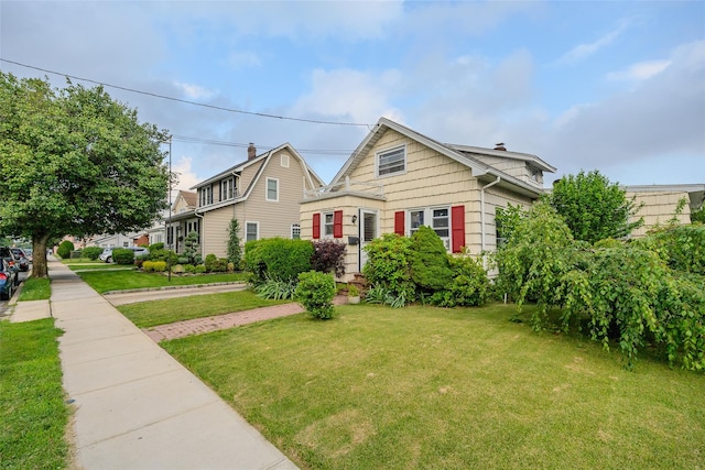43 Westbury Ave, Mineola, NY 11501 - dutch colonial with a front yard