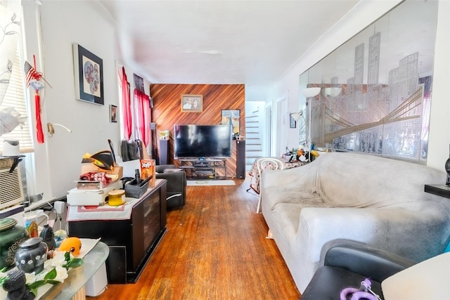 43 Westbury Ave, Mineola, NY 11501 - living room featuring wood walls and wood finished floors