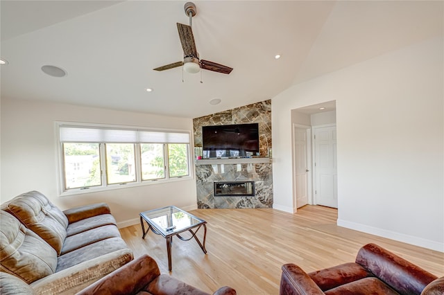 714 Montauk, West Islip, NY 11795 - living room with ceiling fan, a premium fireplace, wood finished floors, lofted ceiling, and recessed lighting