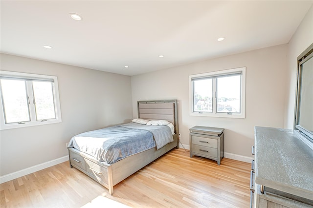 714 Montauk, West Islip, NY 11795 - bedroom featuring multiple windows, light wood finished floors, and recessed lighting