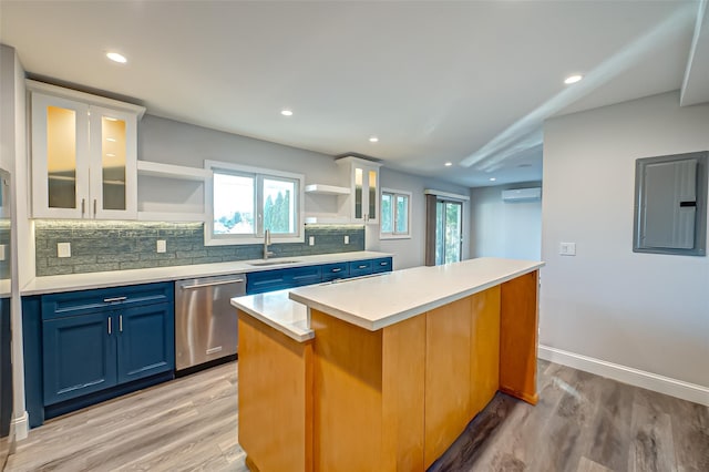 714 Montauk, West Islip, NY 11795 - kitchen featuring open shelves, stainless steel dishwasher, blue cabinetry, electric panel, and a kitchen island