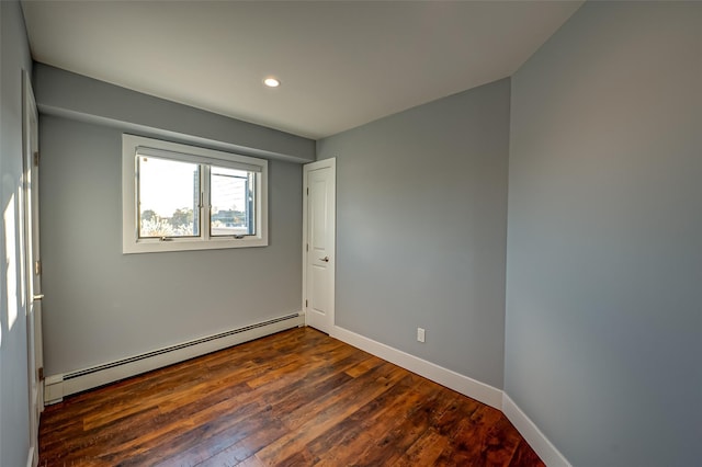 714 Montauk, West Islip, NY 11795 - empty room featuring baseboard heating, hardwood / wood-style floors, and recessed lighting