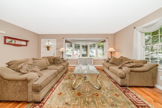 40 Syracuse St, Williston Park, NY 11596 - living area featuring wood finished floors and baseboards