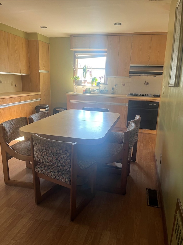 319 Mill Rd, Hewlett, NY 11557 - dining room featuring dark wood finished floors