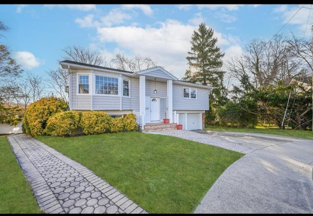 7 Felms Ct, Bethpage, NY 11714 - split foyer home with driveway, a garage, and a front yard