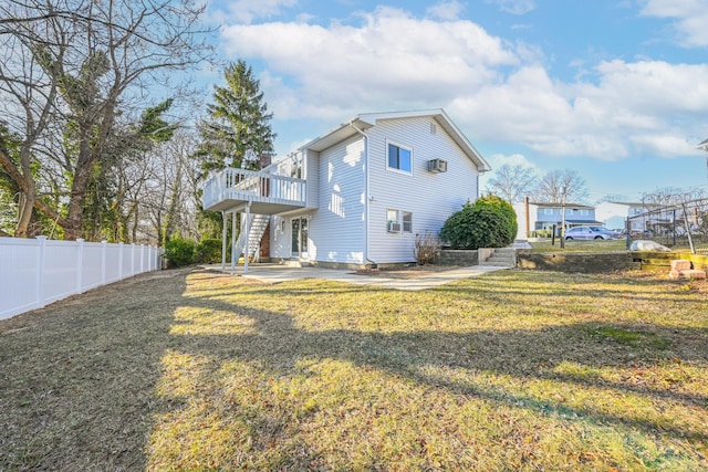 7 Felms Ct, Bethpage, NY 11714 - rear view of house featuring stairway, a wooden deck, and a patio area