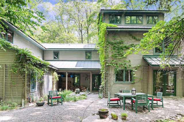 15 Cox Dr, Warwick, NY 10950 - rear view of property with a patio area and a metal roof