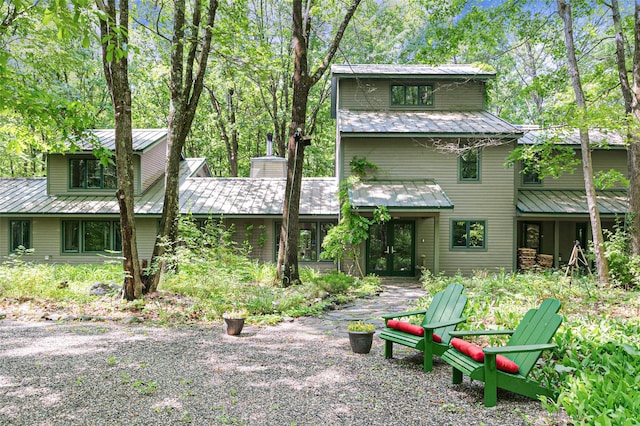 15 Cox Dr, Warwick, NY 10950 - rear view of property featuring a metal roof and french doors