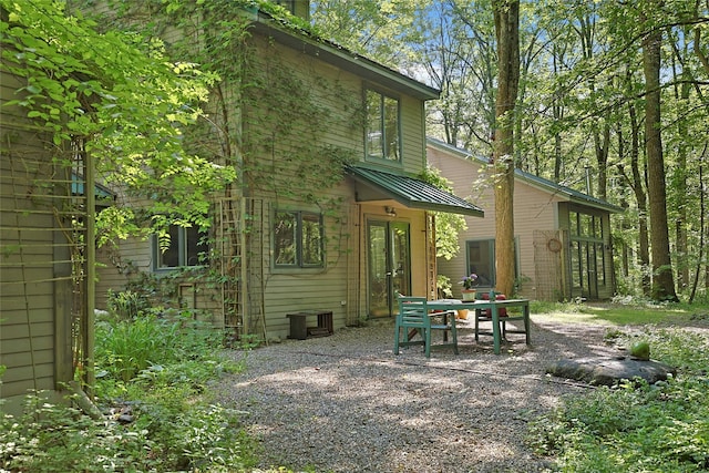 15 Cox Dr, Warwick, NY 10950 - back of house featuring a patio area, a metal roof, and a standing seam roof