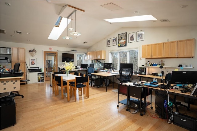 15 Cox Dr, Warwick, NY 10950 - home office with a skylight, light wood-type flooring, and high vaulted ceiling