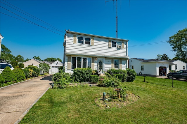 926 9th St, West Babylon, NY 11704 - view of front of home featuring a garage and an outbuilding