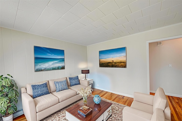926 9th St, West Babylon, NY 11704 - living area with wood finished floors and baseboards