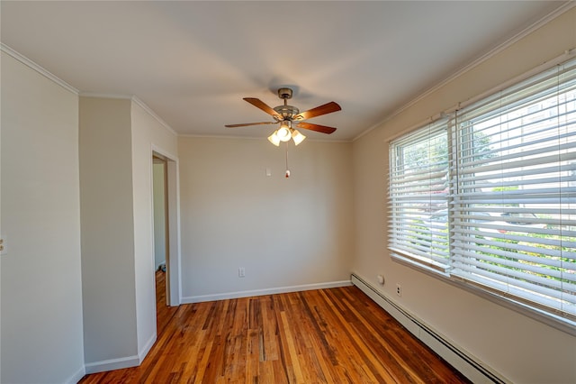 926 9th St, West Babylon, NY 11704 - empty room with baseboard heating, wood finished floors, a ceiling fan, and ornamental molding