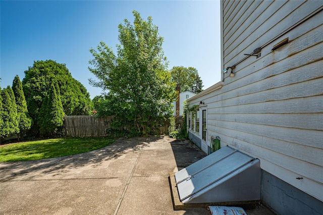 926 9th St, West Babylon, NY 11704 - fenced backyard with a patio area