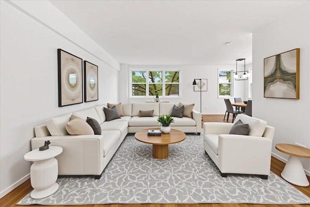 76 Dehaven Dr Unit 6B, Yonkers, NY 10703 - living area featuring healthy amount of natural light and wood finished floors