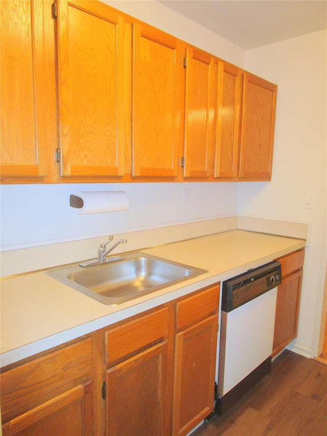 76 Dehaven Dr Unit 6B, Yonkers, NY 10703 - kitchen featuring white dishwasher, light countertops, dark wood-style floors, and brown cabinetry