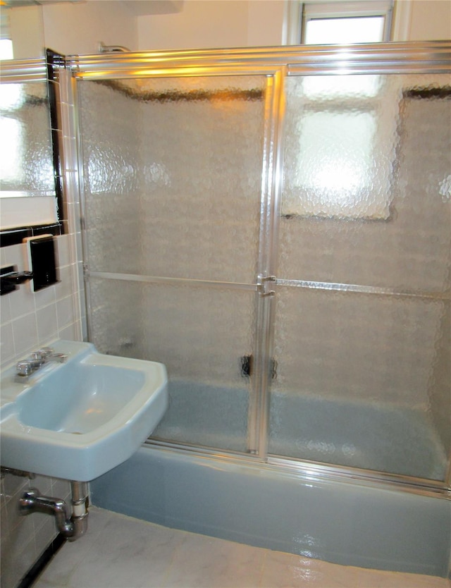 76 Dehaven Dr Unit 6B, Yonkers, NY 10703 - full bathroom with bath / shower combo with glass door and a sink