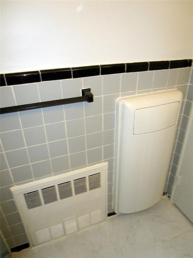 76 Dehaven Dr Unit 6B, Yonkers, NY 10703 - bathroom with tile walls and marble finish flooring