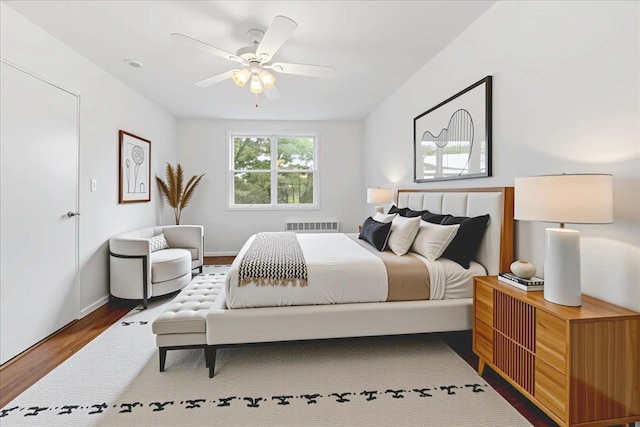 76 Dehaven Dr Unit 6B, Yonkers, NY 10703 - bedroom featuring wood finished floors, radiator heating unit, and a ceiling fan