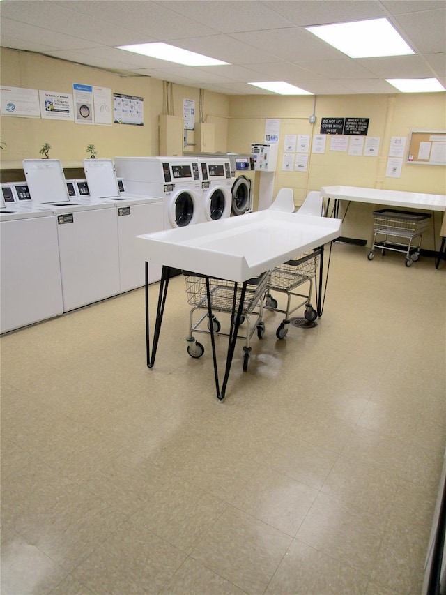 76 Dehaven Dr Unit 6B, Yonkers, NY 10703 - recreation room featuring independent washer and dryer, a drop ceiling, and light flooring