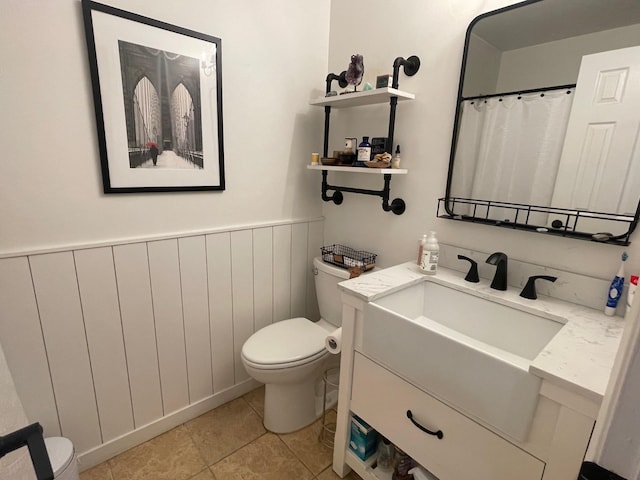 892 Skyline Dr Unit 892, Coram, NY 11727 - full bathroom with vanity, wainscoting, and tile patterned floors